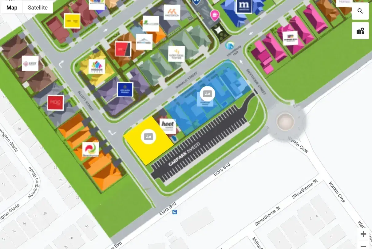 Illustrated display village map with builders’ logos on each home, overlaid on a street map