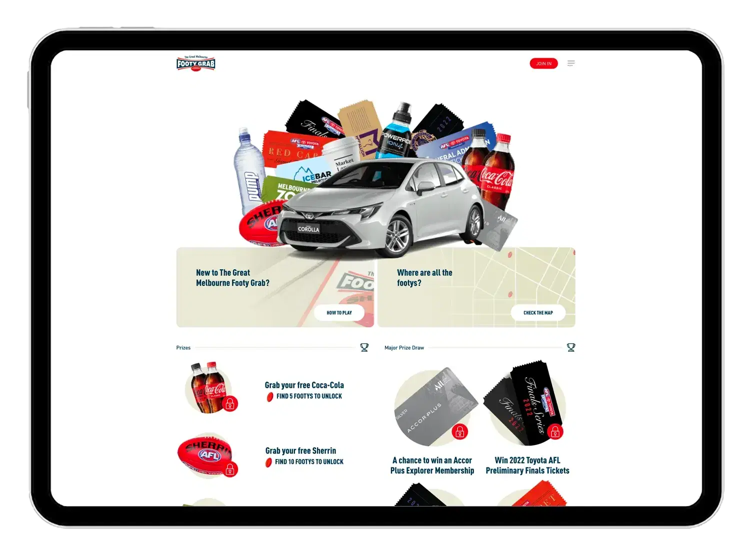The Great Melbourne Footy Grab website shown on a tablet